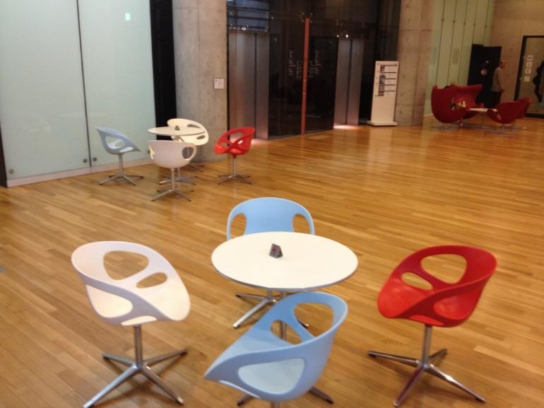 The basement area is a cool oasis with designer chairs