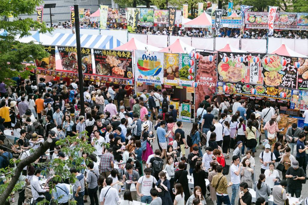 crowds visiting okinawa festival in tokyo
