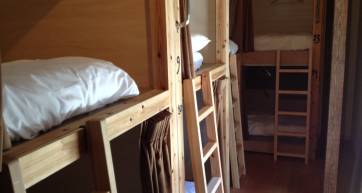 Each bed is more like a capsule with a heavy curtain providing some privacy