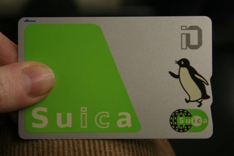 Suica card in hand