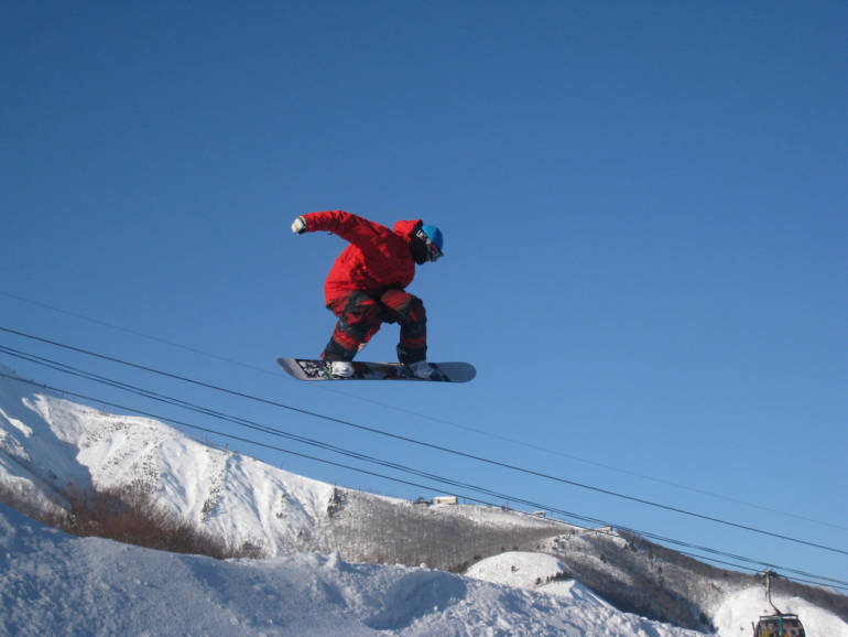 a person snowboarding at Hakuba