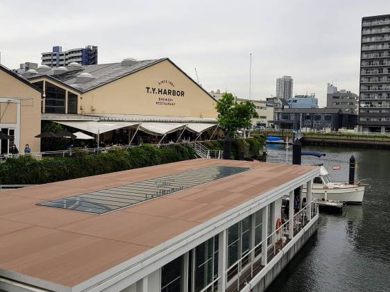 a harbor restaurant with a terrace