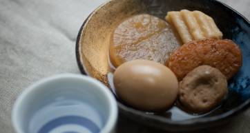 Oden (おでん) is a Japanese winter dish consisting of several ingredients such as boiled eggs, daikon radish, konnyaku, and processed fish cakes stewed in a light, soy-flavoured dashi broth. Ingredients vary according to region and between each household. Karashi (Japanese mustard) is often used as a condiment.