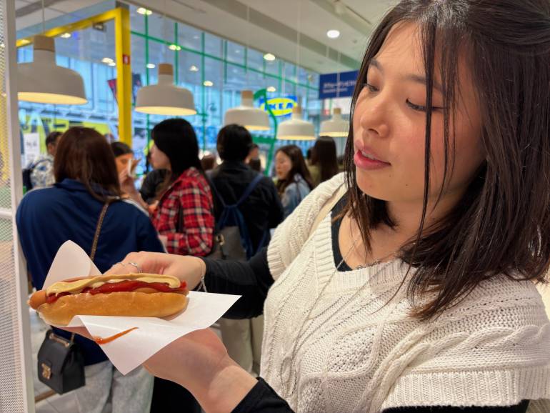 Aila with an IKEA hotdog