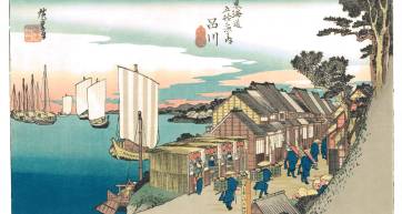 Shinagawa: Sunrise, a woodblock print from Hiroshige's Fifty-three Stations of the Tōkaidō, showing sailboats in Edo Bay and travelers passing shorefront houses