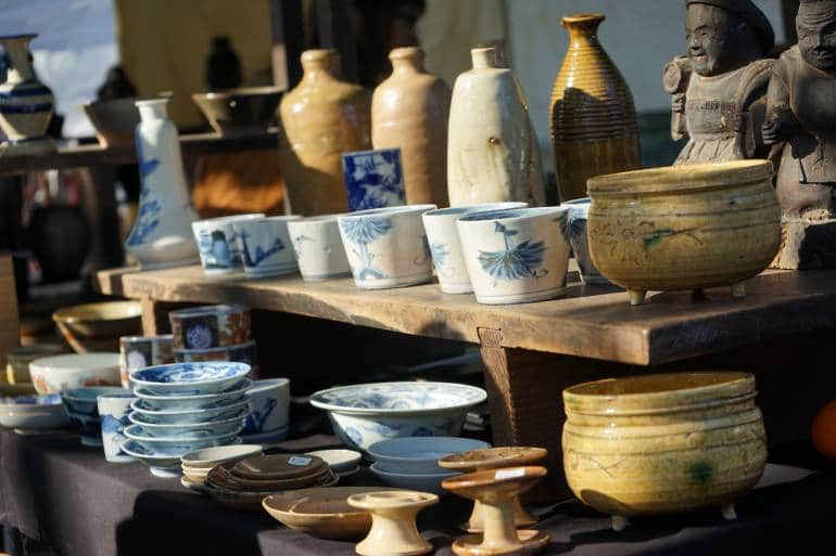 ceramics on shelves at kyoto flea market