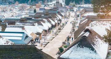 Ouchi Juku ancient farmer house village with snow in winter, former post town along the Aizu-Nishi Kaido trade route during the Edo Period. Shimogo town, Minamiaizu, Fukushima Prefecture, Japan