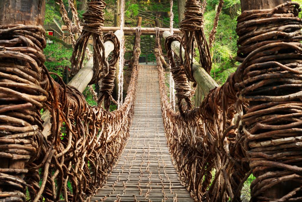 Iya Valley, Tokushima, Japan at the Kazurabashi vine bridge. Though rebuilt periodically, the history of the bridge dates back to more than 800 years.