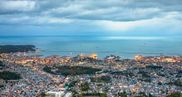 Otaru, Hokkaido, Japan town cityscape over Ishikari Bay at dusk.
