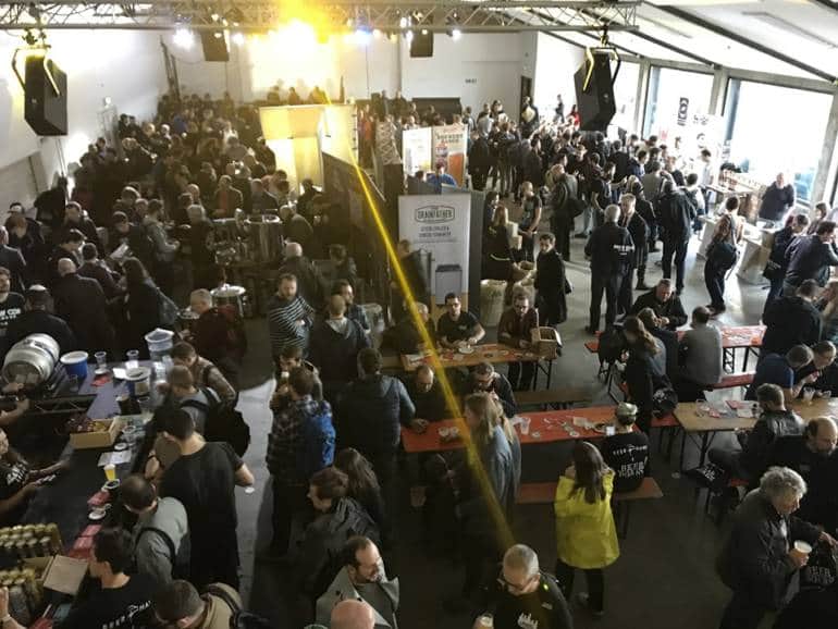 A large group of people in a brewery