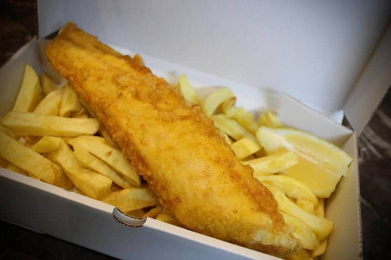 fish and chips in a takeaway box