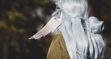 Anime style, cosplayer girl in a blue wig.